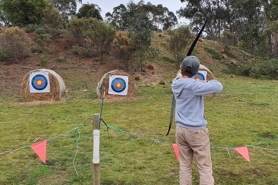 An archer taking aim at the targets
