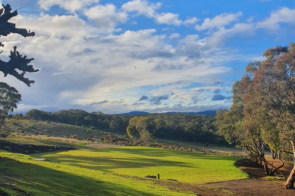 The green valley under a big Victorian sky