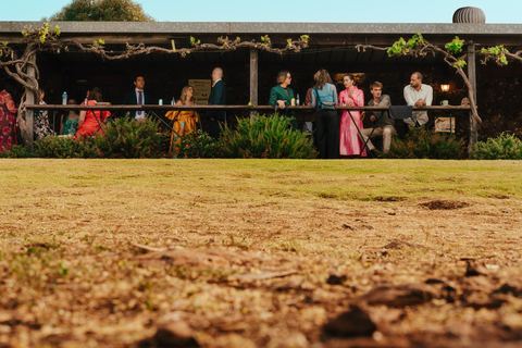 Guests gathered on the verandah overlooking the grounds