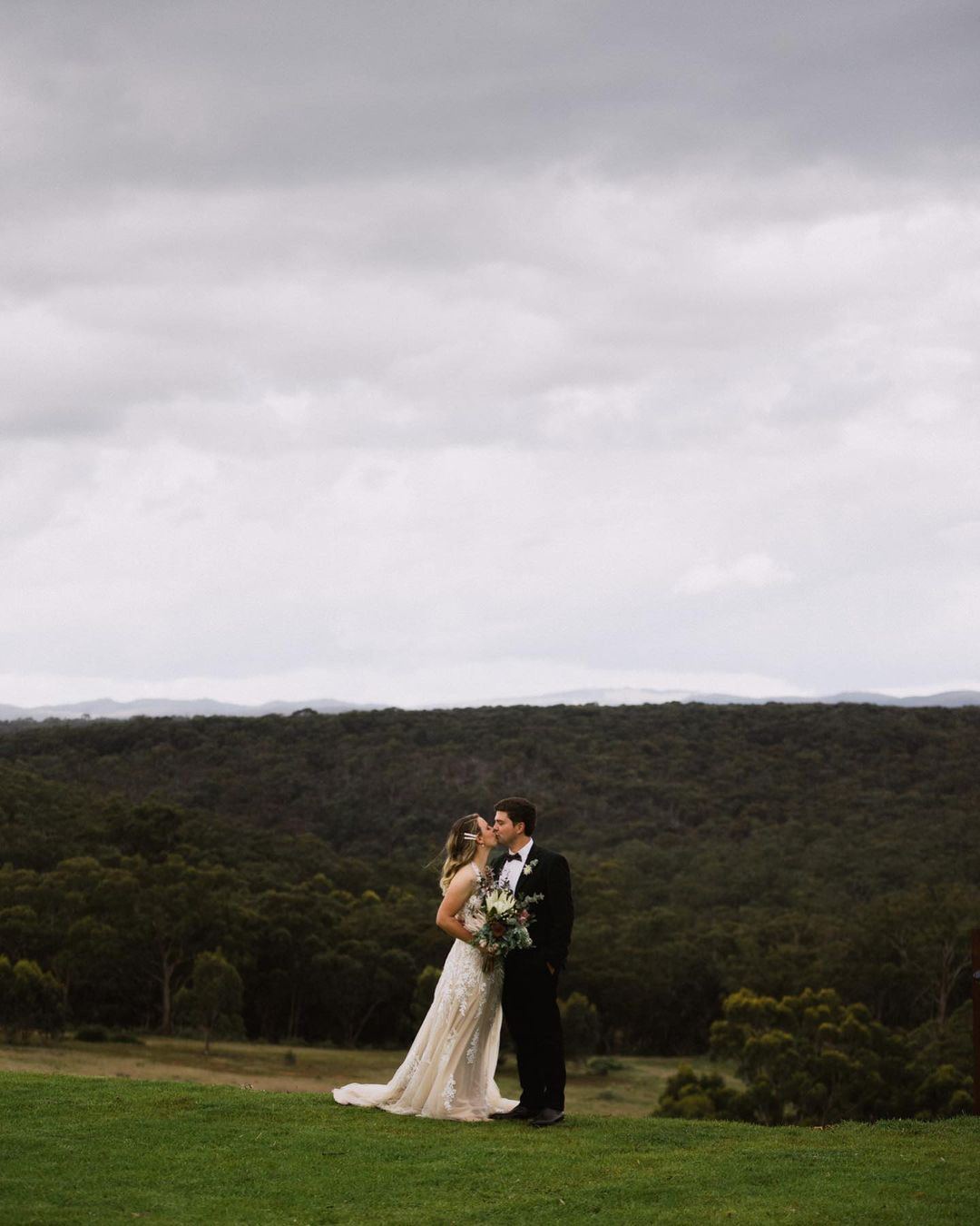 A couple taking in the views to the Macedon Ranges